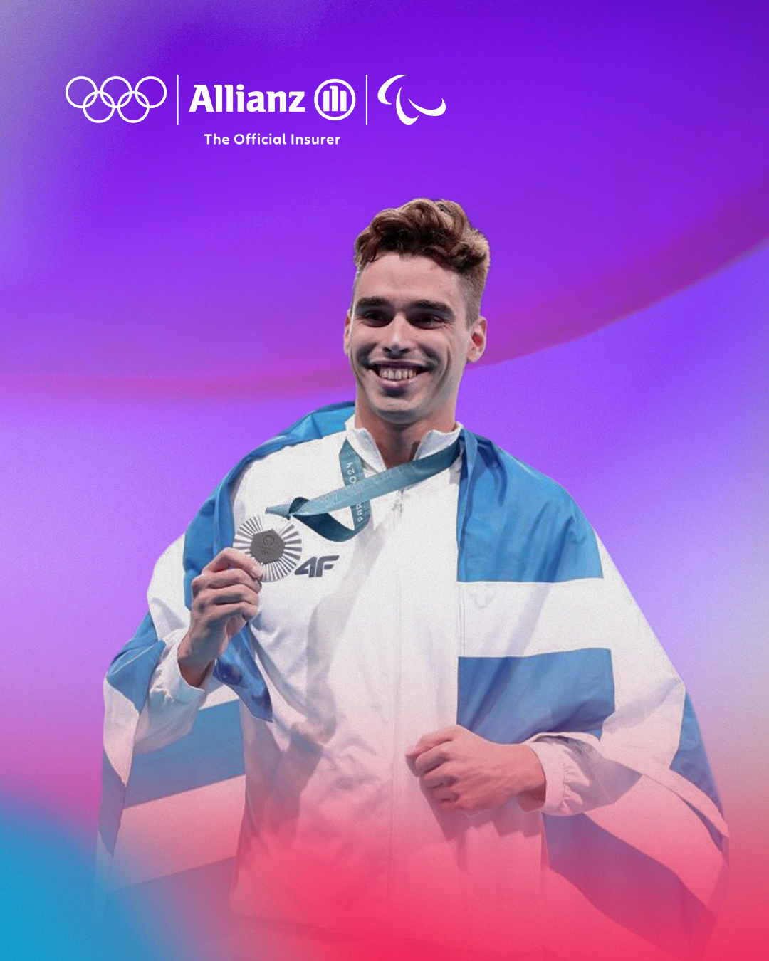 Apostolos Xristou holding silver medal with Allianz background